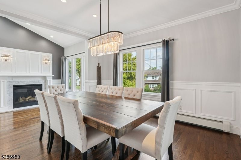 Chandelier, Dining room, Fireplace, Interior, Recessed Lighting, Wood Texture Flooring