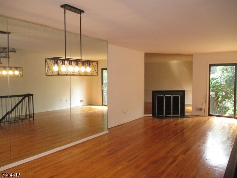 Empty room, Fireplace, Interior, Pendant Lights, Wood Texture Flooring