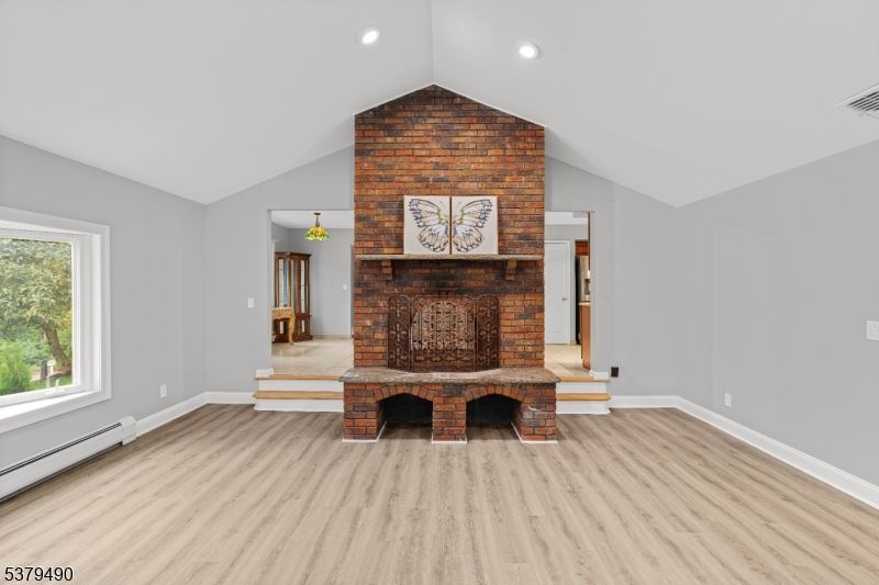 Fireplace, Interior, Recessed Lighting, Stone Walls, Wood Texture Flooring