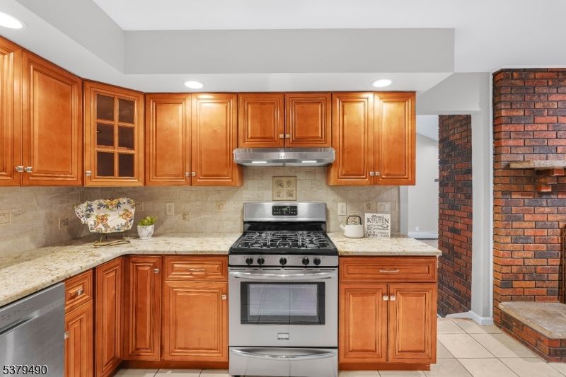 Interior, Kitchen, Recessed Lighting, Stainless Steel Appliances, Stone Walls