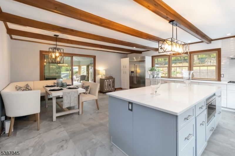 Chandelier, Dining room, Interior, Kitchen, Living room, Marble, Pendant Lights, Recessed Lighting, Wooden Beams