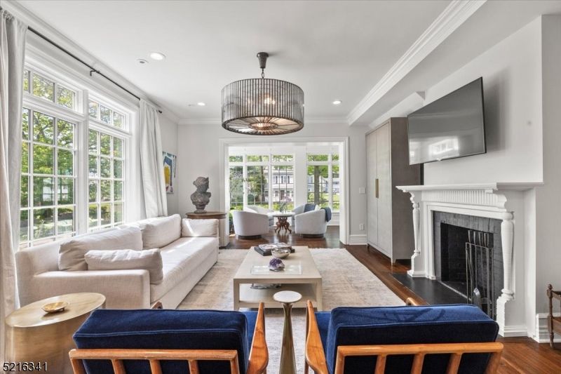 Dining room, Fireplace, Interior, Living room, Pendant Lights, Recessed Lighting, Wood Texture Flooring