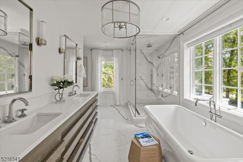 Bathroom, Dual Sink Vanities, Glass Shower, Interior, Marble, Marble Walls, Pendant Lights, Recessed Lighting
