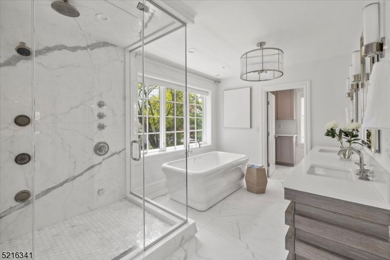 Bathroom, Free Standing Baths, Glass Shower, Interior, Marble, Marble Walls, Pendant Lights, Recessed Lighting