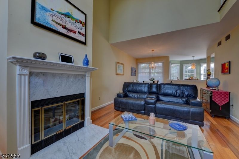 Chandelier, Dining room, Fireplace, Interior, Living room, Pendant Lights, Wood Texture Flooring