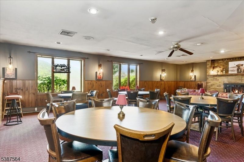 Dining room, Fireplace, Interior, Recessed Lighting, Stone Walls, Wooden Walls