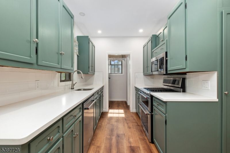 Interior, Kitchen, Recessed Lighting, Stainless Steel Appliances, Wood Texture Flooring