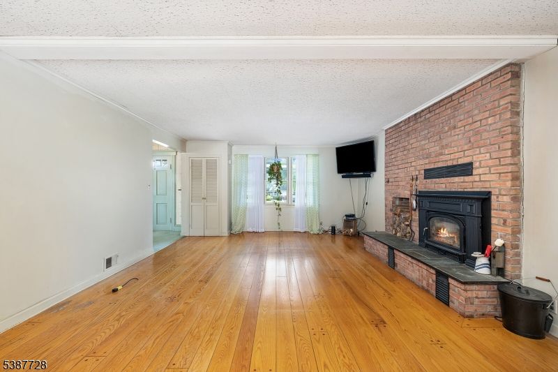Empty room, Fireplace, Interior, Stone Walls, Wood Texture Flooring