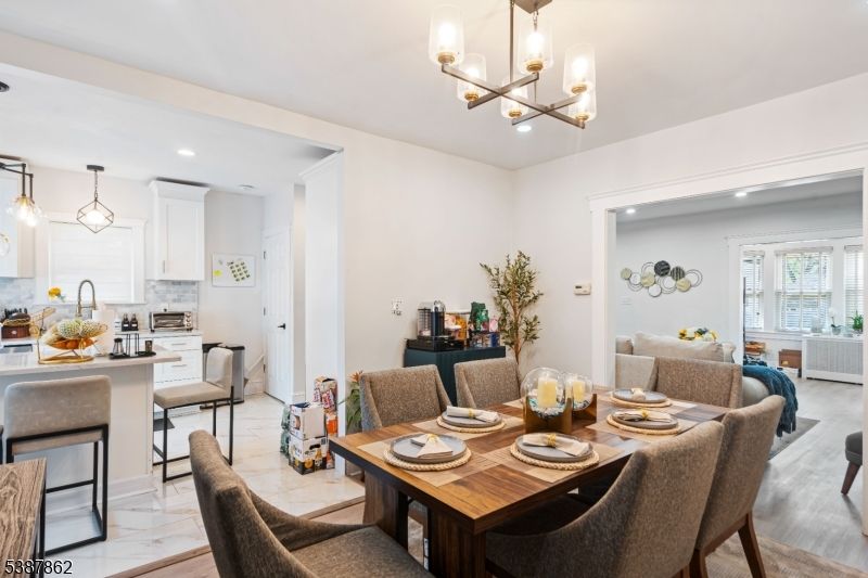 Chandelier, Dining room, Interior, Kitchen, Living room, Marble, Pendant Lights, Recessed Lighting, Wood Texture Flooring
