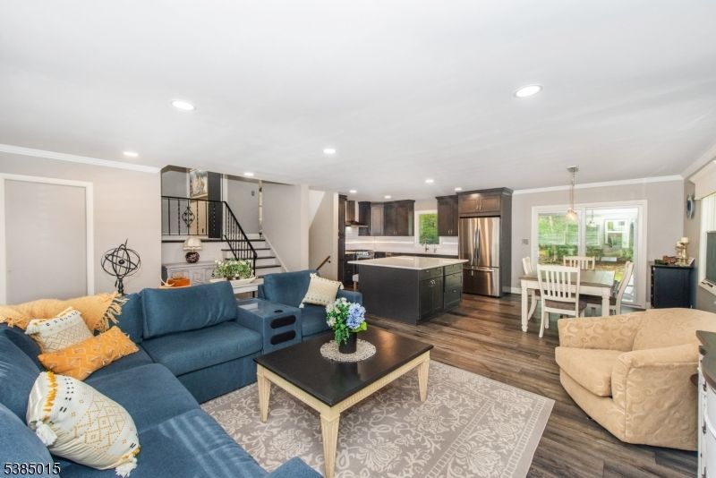 Dining room, Interior, Kitchen, Living room, Pendant Lights, Recessed Lighting, Stainless Steel Appliances, Wood Texture Flooring