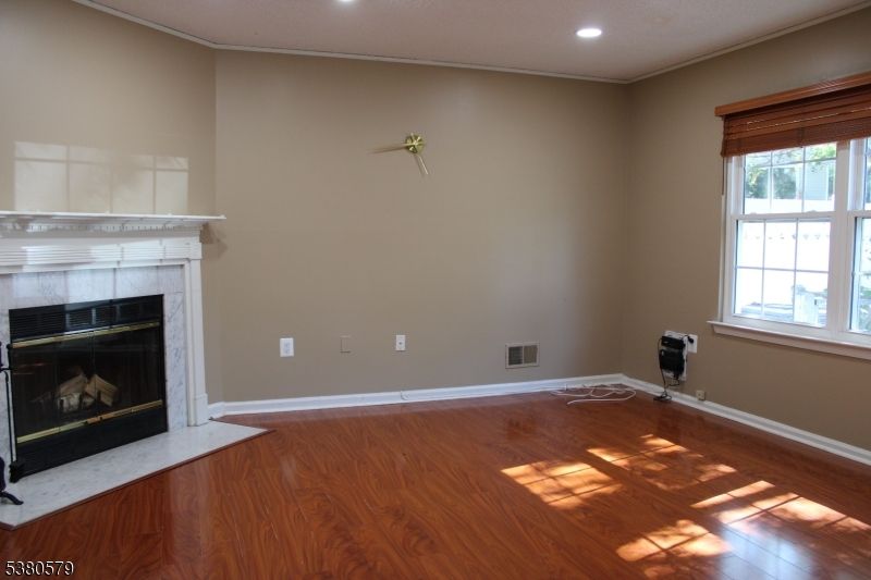 Empty room, Fireplace, Interior, Recessed Lighting, Wood Texture Flooring