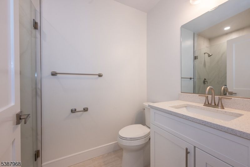 Bathroom, Glass Shower, Interior, Recessed Lighting, Wood Texture Flooring