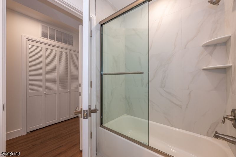 Bathroom, Glass Shower, Interior, Marble Walls, Wood Texture Flooring