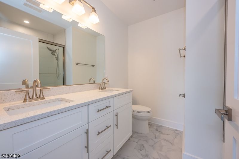 Bathroom, Dual Sink Vanities, Interior, Marble, Recessed Lighting