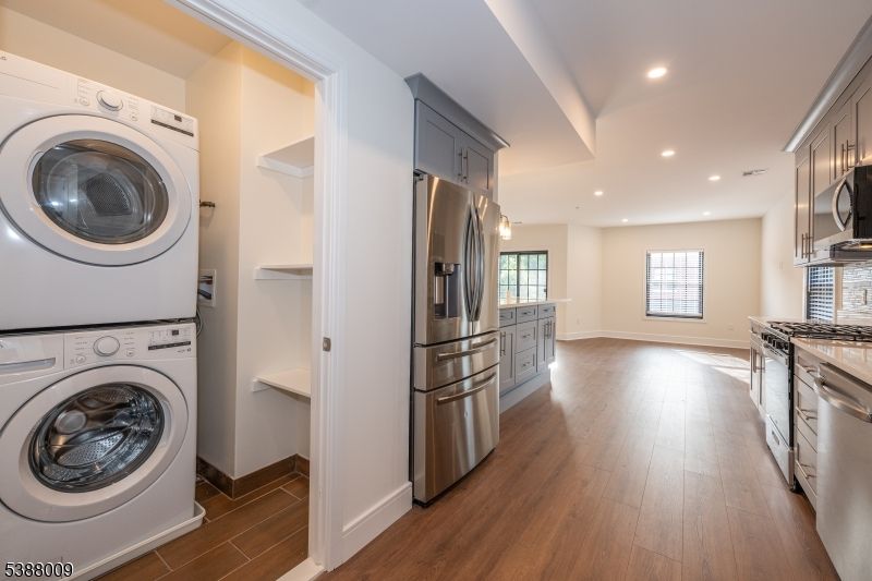 Interior, Kitchen, Recessed Lighting, Stainless Steel Appliances, Washer, Wood Texture Flooring