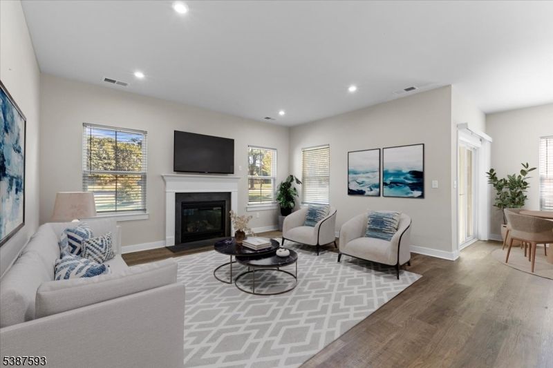 Dining room, Fireplace, Interior, Living room, Recessed Lighting, Wood Texture Flooring