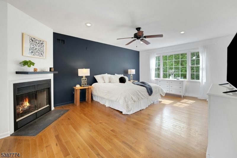 Bedroom, Fireplace, Interior, Recessed Lighting, Wood Texture Flooring