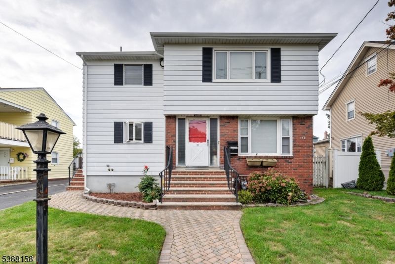 Exterior, Facade, Brick Facade, American Foursquare