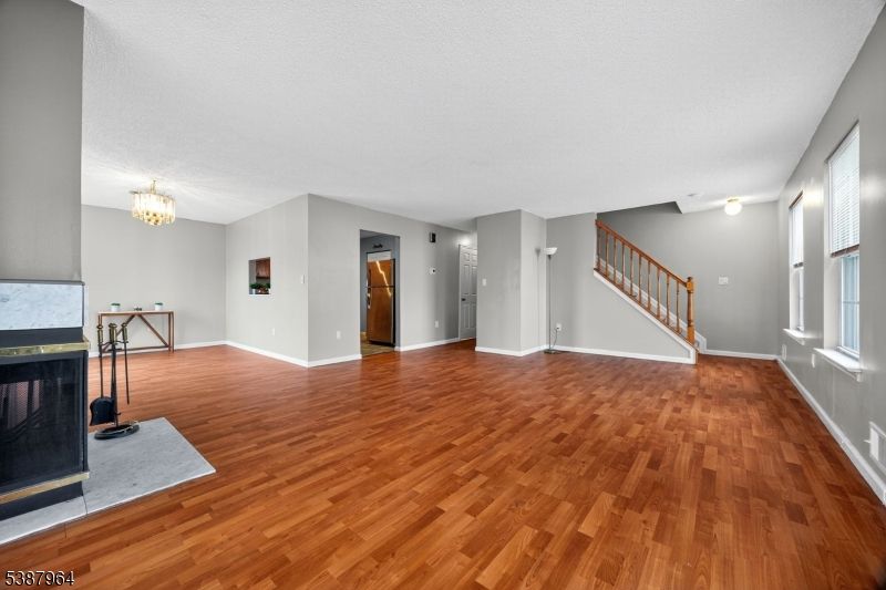 Chandelier, Empty room, Fireplace, Interior, Wood Texture Flooring