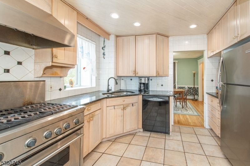 Dining room, Interior, Kitchen, Recessed Lighting, Stainless Steel Appliances, Wood Texture Flooring