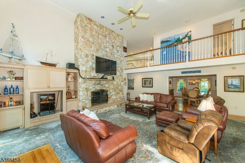 Dining room, Fireplace, Interior, Living room, Recessed Lighting, Stone Walls