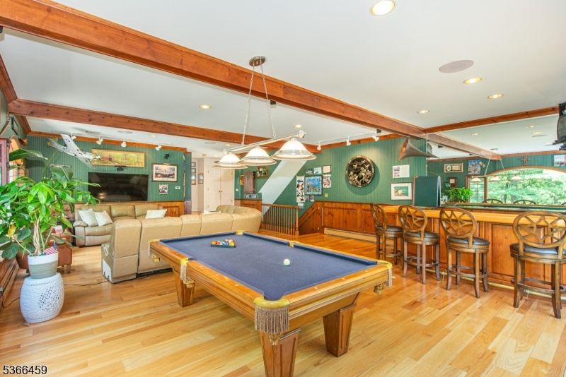 Billiard Table, Chandelier, Game Room, Interior, Living room, Pendant Lights, Recessed Lighting, Wooden Beams, Wood Texture Flooring