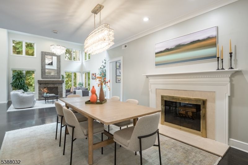 Chandelier, Dining room, Fireplace, Interior, Living room, Recessed Lighting, Wood Texture Flooring