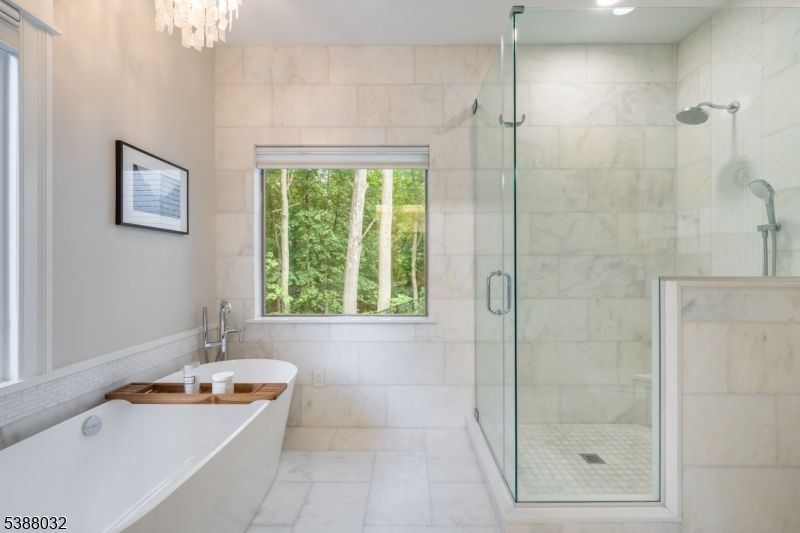 Bathroom, Chandelier, Free Standing Baths, Glass Shower, Interior, Marble, Marble Walls, Recessed Lighting