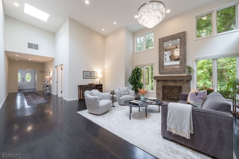 Chandelier, Fireplace, Interior, Living room, Recessed Lighting, Wood Texture Flooring