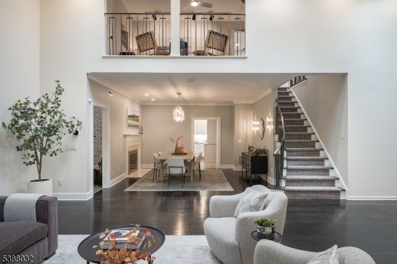 Dining room, Fireplace, Interior, Living room, Recessed Lighting, Wood Texture Flooring