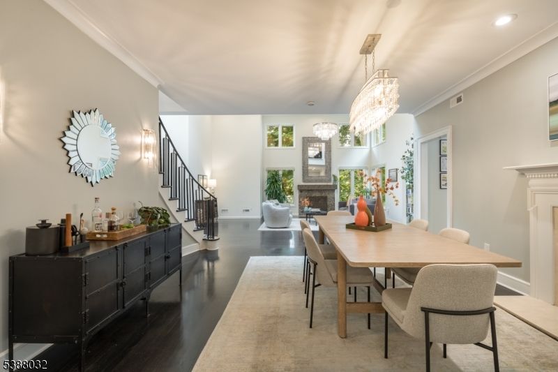 Chandelier, Dining room, Fireplace, Interior, Living room, Recessed Lighting, Wood Texture Flooring