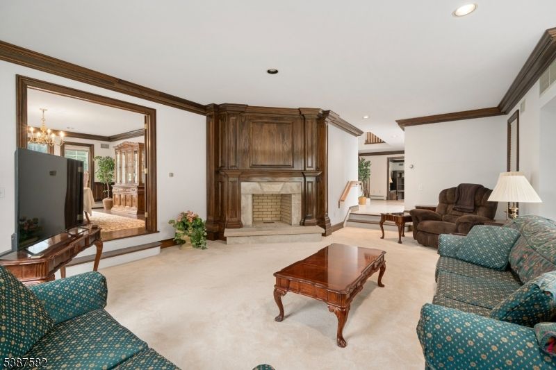 Chandelier, Fireplace, Interior, Living room, Recessed Lighting