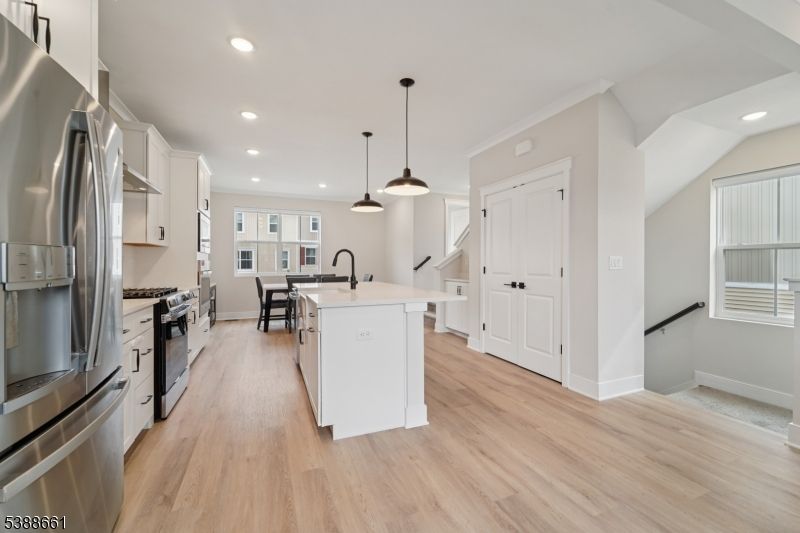 Interior, Kitchen, Pendant Lights, Recessed Lighting, Stainless Steel Appliances, Wood Texture Flooring