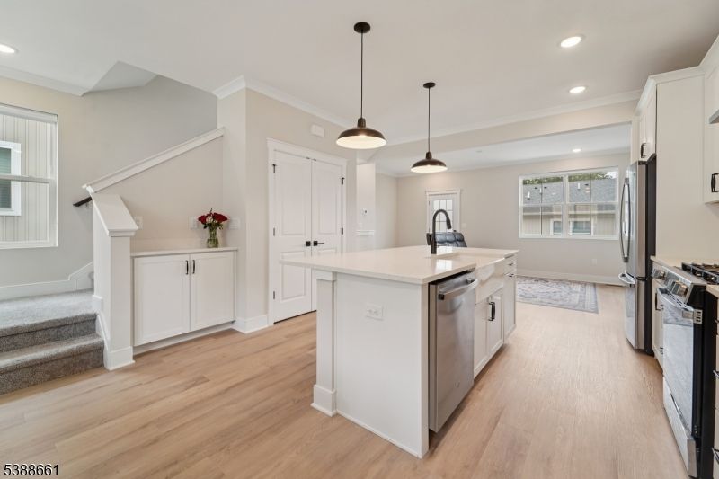 Interior, Kitchen, Pendant Lights, Recessed Lighting, Stainless Steel Appliances, Wood Texture Flooring