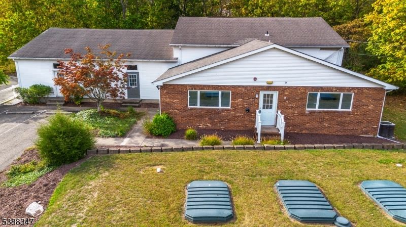 Exterior, Facade, Brick Facade, Cape Cod