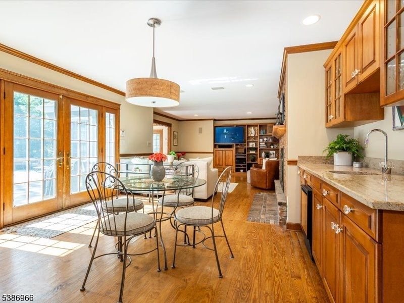 Dining room, Fireplace, Interior, Kitchen, Living room, Recessed Lighting, Wood Texture Flooring