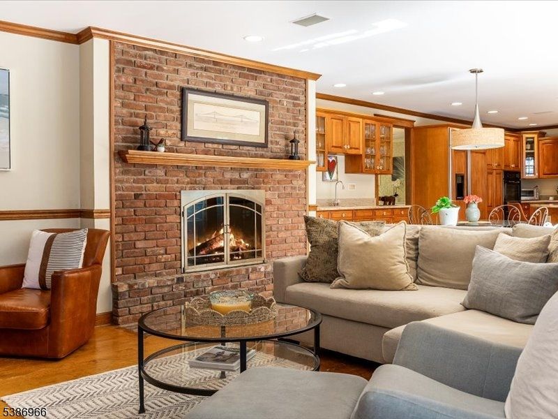 Fireplace, Interior, Kitchen, Living room, Pendant Lights, Recessed Lighting, Stone Walls, Wood Texture Flooring