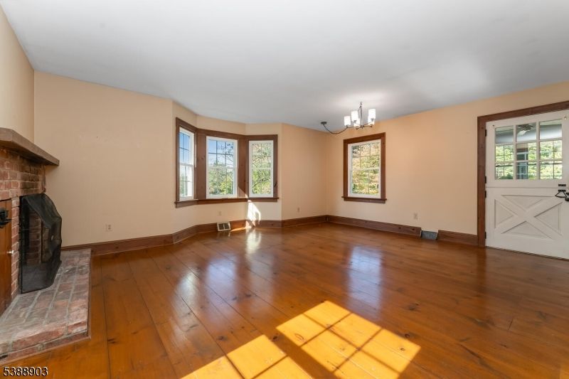 Chandelier, Empty room, Fireplace, Interior, Wood Texture Flooring