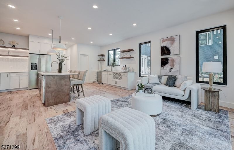 Dining room, Interior, Kitchen, Living room, Pendant Lights, Recessed Lighting, Stainless Steel Appliances, Wood Texture Flooring