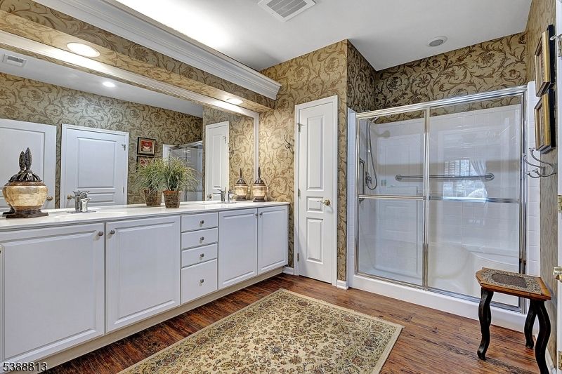 Bathroom, Dual Sink Vanities, Glass Shower, Interior, Recessed Lighting, Wood Texture Flooring