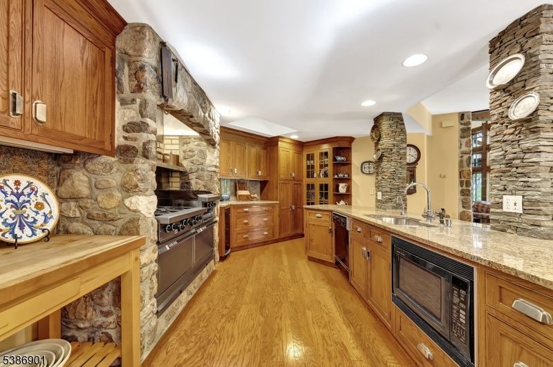 Interior, Kitchen, Recessed Lighting, Stainless Steel Appliances, Stone Walls, Wood Texture Flooring