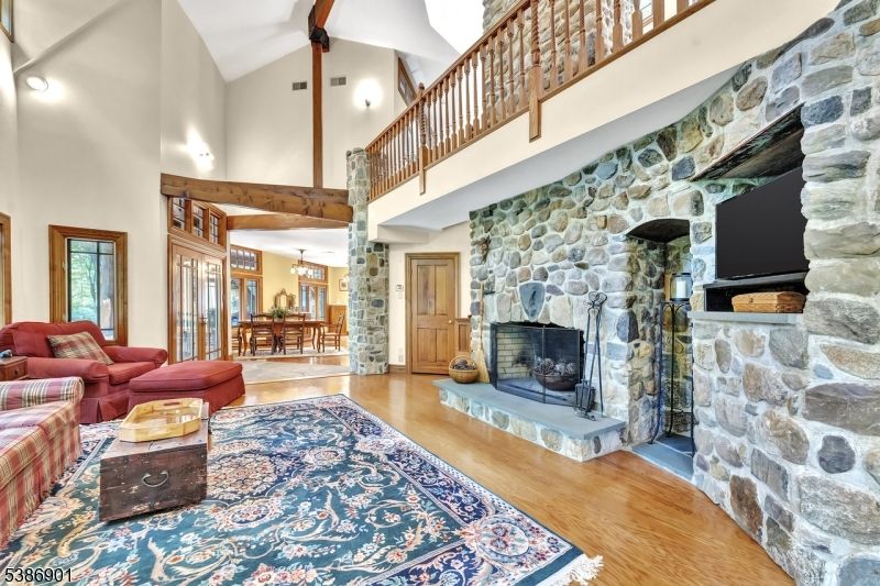 Dining room, Fireplace, Interior, Living room, Stone Walls, Wooden Beams, Wood Texture Flooring