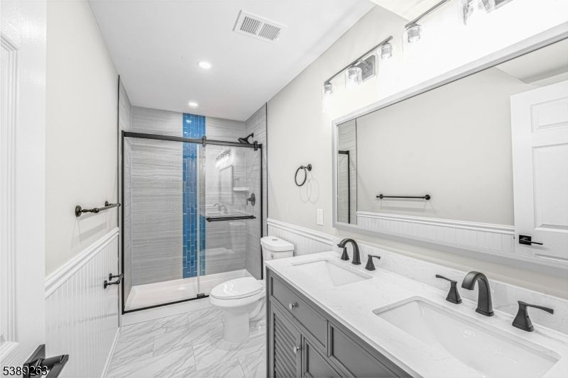 Bathroom, Dual Sink Vanities, Glass Shower, Interior, Marble, Recessed Lighting