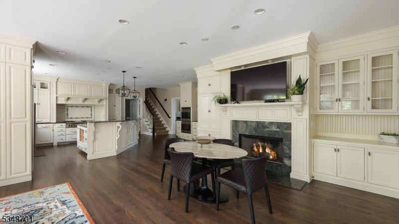 Dining room, Fireplace, Interior, Kitchen, Pendant Lights, Recessed Lighting, Wood Texture Flooring
