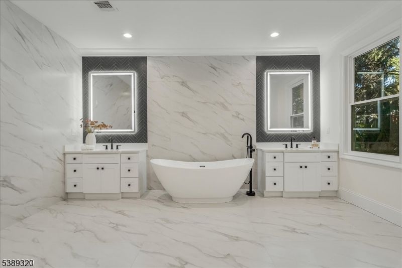 Bathroom, Dual Sink Vanities, Free Standing Baths, Interior, Marble, Marble Walls, Recessed Lighting