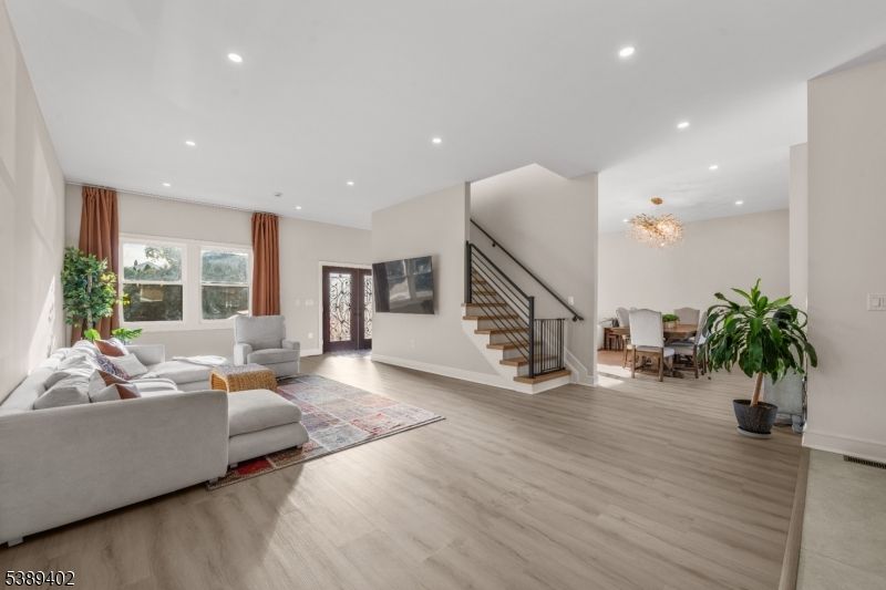 Chandelier, Dining room, Interior, Living room, Recessed Lighting, Wood Texture Flooring