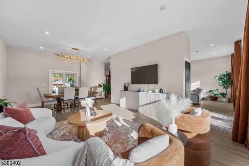 Chandelier, Dining room, Interior, Living room, Pendant Lights, Recessed Lighting, Wood Texture Flooring