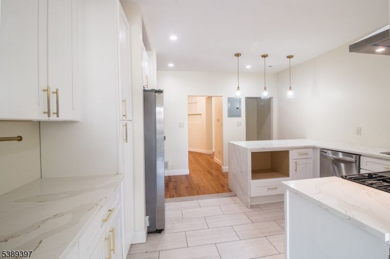Interior, Kitchen, Pendant Lights, Recessed Lighting, Stainless Steel Appliances, Wood Texture Flooring