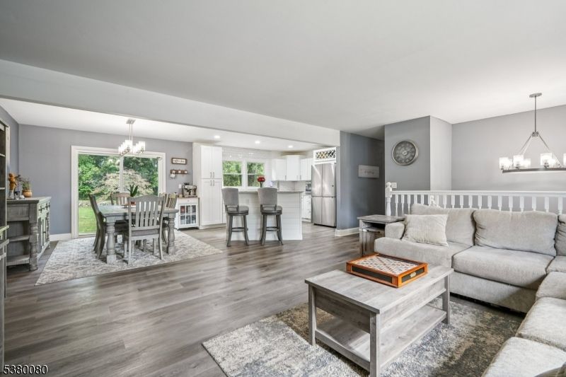 Chandelier, Dining room, Interior, Kitchen, Living room, Pendant Lights, Recessed Lighting, Wood Texture Flooring