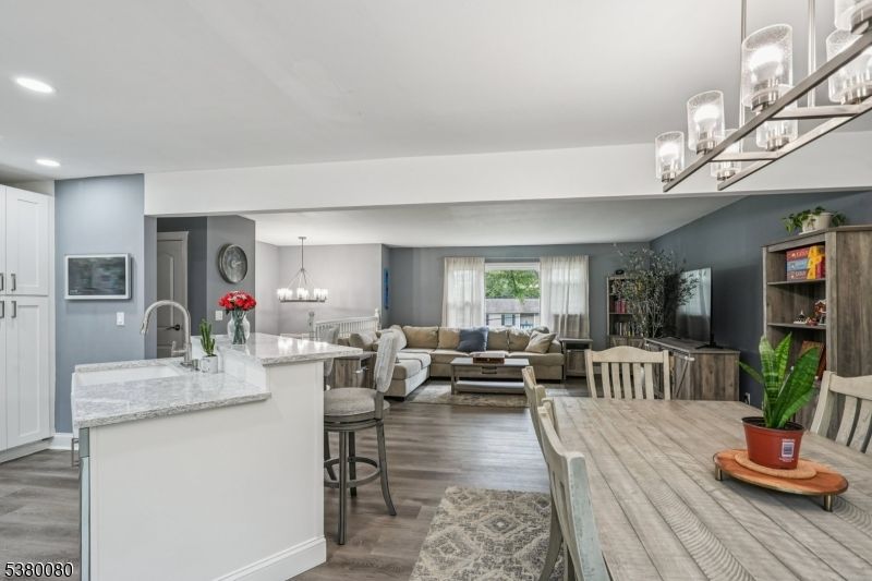 Chandelier, Dining room, Interior, Kitchen, Living room, Recessed Lighting, Wood Texture Flooring